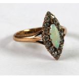 LATE VICTORIAN 18ct GOLD, OPAL AND DIAMOND MARQUISE RING, set with centre lozenge shaped opal and