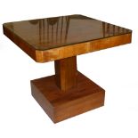 AN ART DECO WALNUT VENEERED OCCASIONAL TABLE, the square top raised on central column and a square
