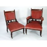 PAIR OF VICTORIAN CARVED WALNUT LADY'S AND GENTLEMAN'S DRAWING ROOM EASY CHAIRS, each with moulded