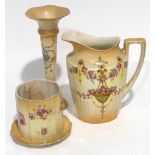 THREE IVORY GROUND FLORAL PRINTED VASES, A JUG AND A JAR WITH SAUCER SHAPED BASE