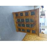 OMANI, CARVED WOOD SIDE CABINET WITH CENTRE CUPBOARD WITH TWO DOORS FLANKED BY TWO COLUMNS OF FOUR