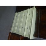 A MODERN WHITE LACQUERED FINISH CHEST, OF TWO SHORT AND THREE LONG DRAWERS, ON PLINTH BASE, 2'10"