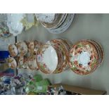 LATE VICTORIAN CHINA TEA SET SUFFICIENT FOR 11 PERSONS, WITH FLORAL PRINTED AND PAINTED DECORATION