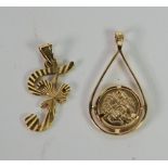MOROCCAN GOLD COLOURED METAL PENDANT set with a small Moroccan gold coin and an Israeli 14k gold