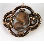 VICTORIAN GOLD AND BLACK ENAMELLED LARGE OPENWORK FOLIATE SCROLL MOURNING BROOCH, quatrefoil