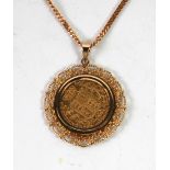 VICTORIAN GOLD SOVEREIGN 1861, loose framed in a 9ct gold mount as a pendant with filigree surround,