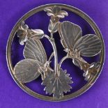 A GEORG JENSEN SILVER LARGE OPENWORK CIRCULAR BROOCH, No. 283, 'Moonlight Blossom', depicting two