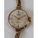 LADY'S ROTARY 9ct GOLD WRIST WATCH, with 21 jewel movement, circular silvered dial with baton and