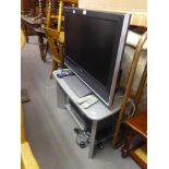 TOSHIBA 'REGZA' FLAT SCREEN TELEVISION ON GREY METAL STAND, A TOSHIBA DVD PLAYER, A DIGI-BOX AND