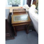 A LATE VICTORIAN MAHOGANY DAVENPORT DESK, OF TYPICAL FORM WITH LIDDED STATIONARY COMPARTMENT WITH