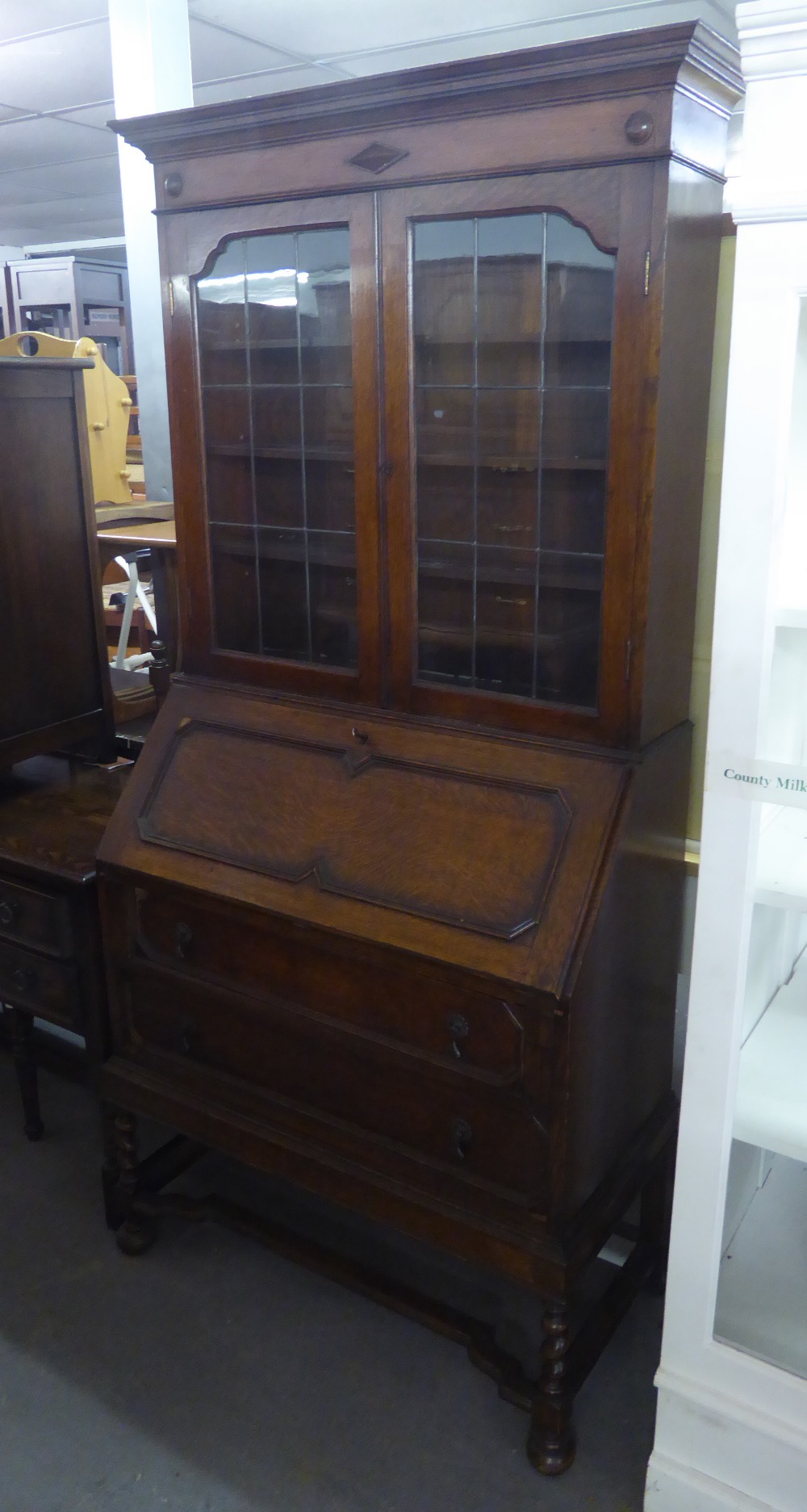 1920's OAK JACOBEAN STYLE BUREAU BOOKCASE