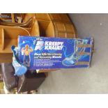 A 'KREEPY KRAULY' POOL VACUUMING AND CLEANING MACHINE