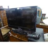 SAMSUNG FLAT SCREEN TV, 26" AND A SAMSUNG DVD PLAYER (2)