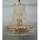 IMPRESSIVE MODERN GILT METAL AND CUT GLASS SIXTEEN LIGHT TENT AND BAG TYPE ELECTROLIER, the lower