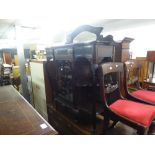 A LATE VICTORIAN DARK MAHOGANY DISPLAY SIDE CABINET, with low mirror back, drawer and glazed