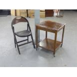 A POLISHED WOOD SMALL SQUARE COFFEE TABLE, AND A FOLD FLAT CHAIR