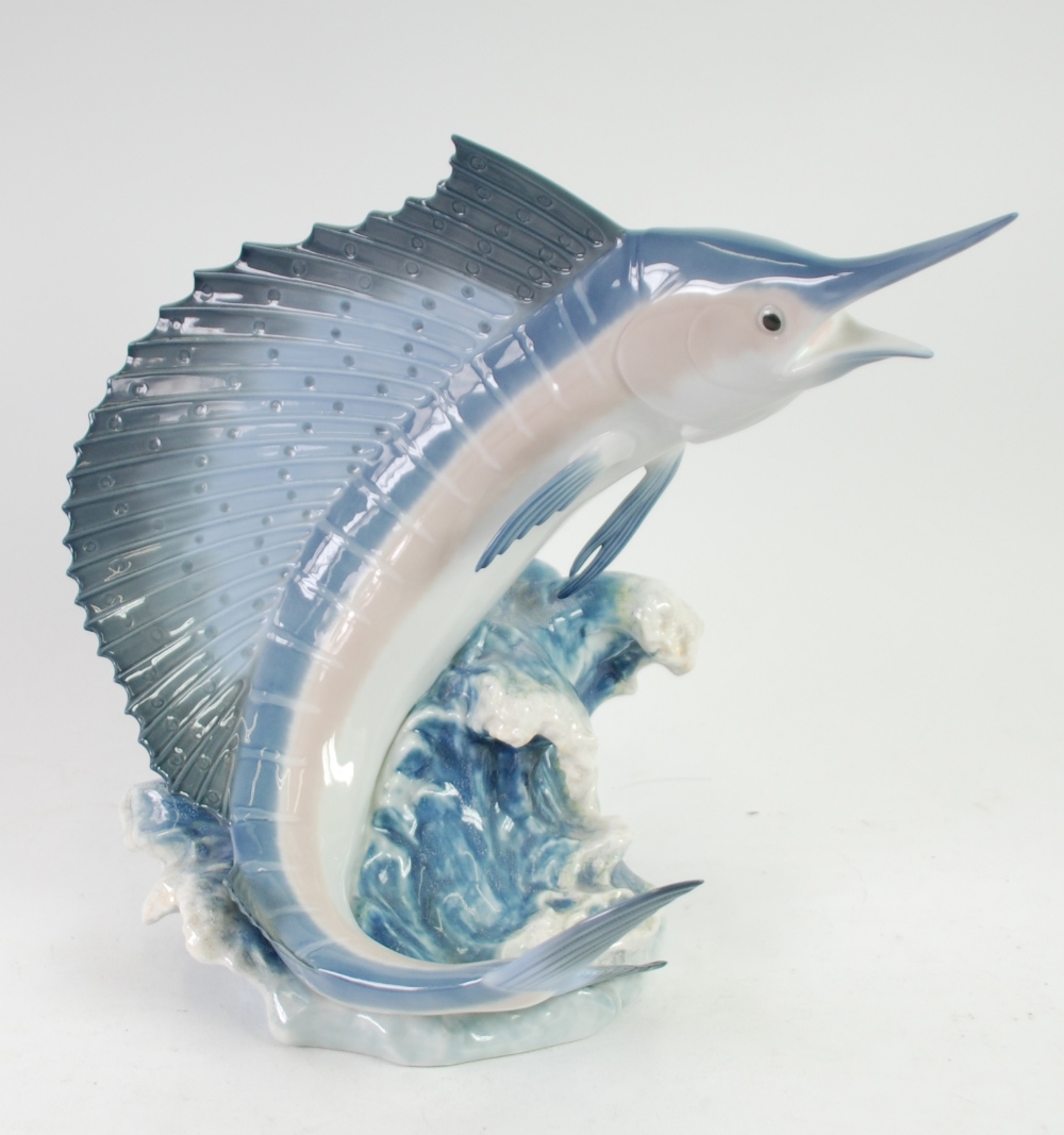 ARTIST SIGNED PORCELAIN MODEL 'MAJESTY OF THE SEAS' modelled as a leaping marlin, 12" (30.5cm) high,