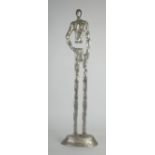 MODERN ALLOY METAL FIGURAL SCULPTURE on an oval base, 31 3/4" (80.8cm) high, unmarked