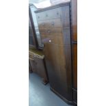 AN ART DECO WALNUT BREAKFRONT BOOKCASE, WITH GLAZED DOOR AND END DISPLAY SECTIONS, EACH WITH A