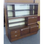 A WOOD EFFECT LARGE SIDE CABINET, WITH DISPLAY SECTION AND WOOD EFFECT STORE CUPBOARD AND FOUR