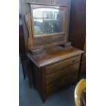 AN EARLY TWENTIETH CENTURY WALNUT WARDROBE WITH TWO MIRROR DOORS AND DRAWER BELOW AND A DRESSING