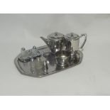 AN OLD HALL STAINLESS STEEL TEA SET OF THREE PIECES, ON HAMMERED TRAY, CONDIMENT SET OF THREE PIECES