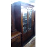 1920's OAK HANG WARDROBE, THE SINGLE DOOR HAVING BEVELLED EDGE OVAL MIRROR PANEL, ONE LONG DRAWER