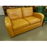 A PAIR OF 'SPRINGVALE LEATHER' TWO SEATER SETTEES, COVERED IN TAN COLOURED LEATHER (IN VERY GOOD