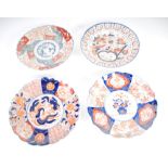 JAPANESE LATE MEIJI PERIOD IMARI PORCELAIN PLATE with pierced border and floral painted centre