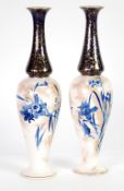 PAIR OF DOULTON BURSLEM POTTERY VASES of slender footed oviform with tall waisted necks, each