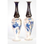 PAIR OF DOULTON BURSLEM POTTERY VASES of slender footed oviform with tall waisted necks, each