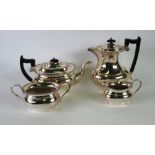 FOUR PIECE ELECTROPLATED TEA SET, of rounded oblong form with angular scroll handles, bobbin and