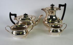 FOUR PIECE ELECTROPLATED TEA SET, of rounded oblong form with angular scroll handles, bobbin and