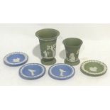 TWO WEDGWOOD PALE GREEN AND WHITE JASPERWARE VASES AND A SIMILAR ASHTRAY AND THE BLUE AND WHITE