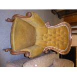 VICTORIAN MAHOGANY FRAMED GENTLEMAN'S EASY ARMCHAIR WITH BUTTON BACK, COVERED IN GOLD PLUSH, AND A