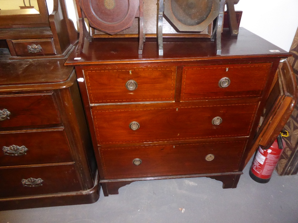 EDWARDIAN MAHOGANY AND LINE INLAID CHEST OF FOUR DRAWERS (2 over 2) WITH RING HANDLES AND SHORT BACK