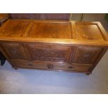 VICTORIAN OAK LINEN/BEDDING BOX, THE THREE PANELLED HINGED LID OVER DECORATIVE CARVED FRONT PANELS