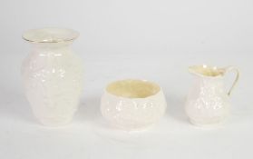 THREE PIECES OF MOULDED BELLEEK PORCELAIN comprising a sugar and cream set with lustre glazed