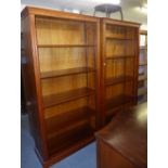 A PAIR OF MAHOGANY FIVE TIER OPEN BOOKCASES