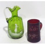 A VICTORIAN MARY GREGORY GREEN AND WHITE GLASS JUG AND A VICTORIAN RUBY STAINED GLASS MUG (2)