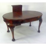 GEORGIAN STYLE MAHOGANY WIND-OUT EXTENDING DINING TABLE, with two extra leaves and a SET OF SIX