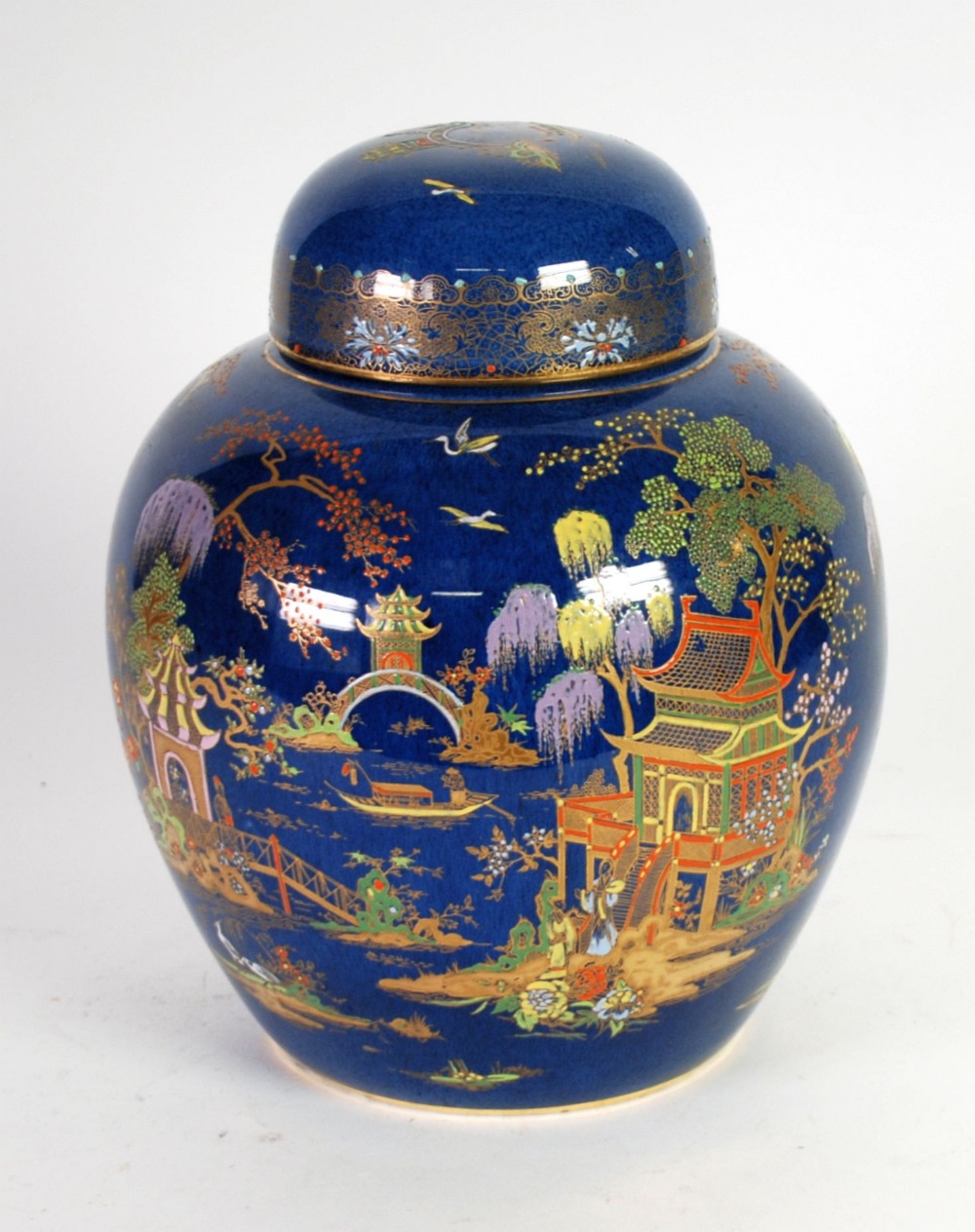 A 1930'S WILTSHAW & ROBINSON CARLTON ware ovoid ginger jar with domed cover, Chinoiserie decorated