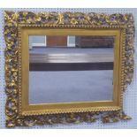 NINETEENTH CENTURY CARVED GILT WOOD LARGE WALL MIRROR, the later oblong plate in a picture type