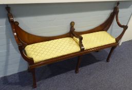 A MAHOGANY WINDOW SEAT WITH RAISED SCROLL ENDS, low raised back, central upholstered seat, on four