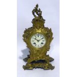 FRENCH LATE NINETEENTH CENTURY ROCOCO REVIVAL GILT METAL CASED BALLOON SHAPED MANTEL CLOCK, having