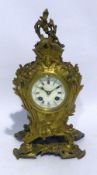 FRENCH LATE NINETEENTH CENTURY ROCOCO REVIVAL GILT METAL CASED BALLOON SHAPED MANTEL CLOCK, having