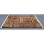 ABBAS ROYAL BELGIUM ALL-WOOL PILE RUG, of Turkoman design in multi colours and having multiple