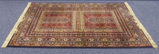 ABBAS ROYAL BELGIUM ALL-WOOL PILE RUG, of Turkoman design in multi colours and having multiple