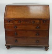 LATE GEORGIAN MAHOGANY BUREAU, the sloping fall front enclosing pigeon holes and drawers with