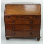 LATE GEORGIAN MAHOGANY BUREAU, the sloping fall front enclosing pigeon holes and drawers with